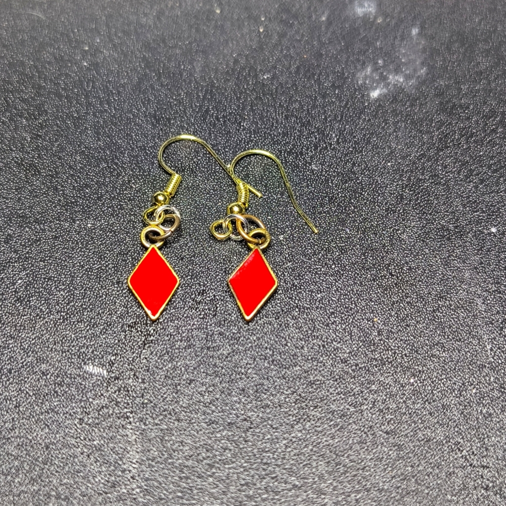 Diamond suit earrings custom made.